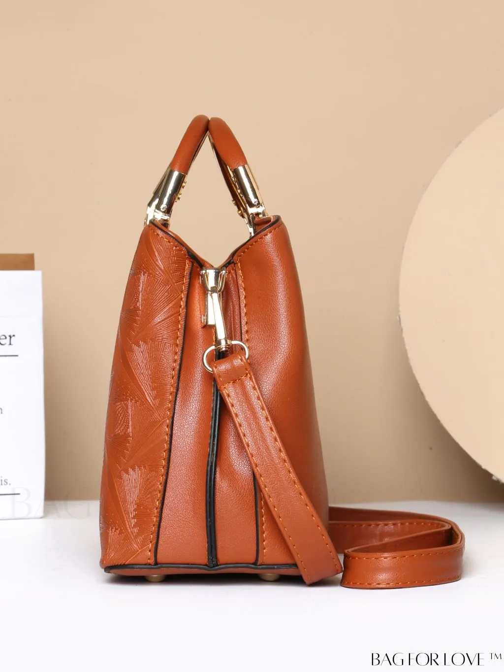 BagForLove - Embossed Metal Ring Handbag: Fashionable, Minimalistic Design for Commuting