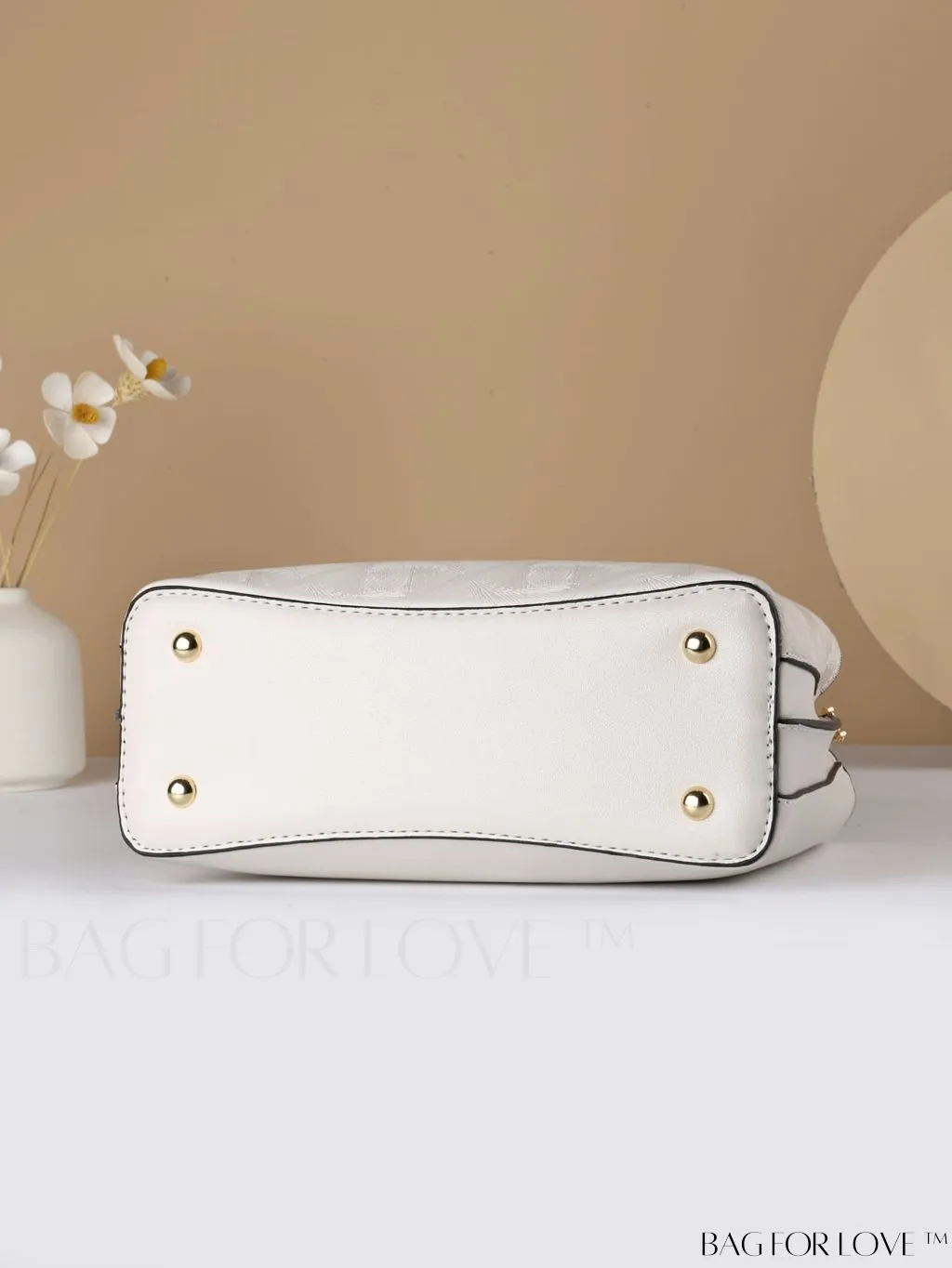 BagForLove - Embossed Metal Ring Handbag: Fashionable, Minimalistic Design for Commuting