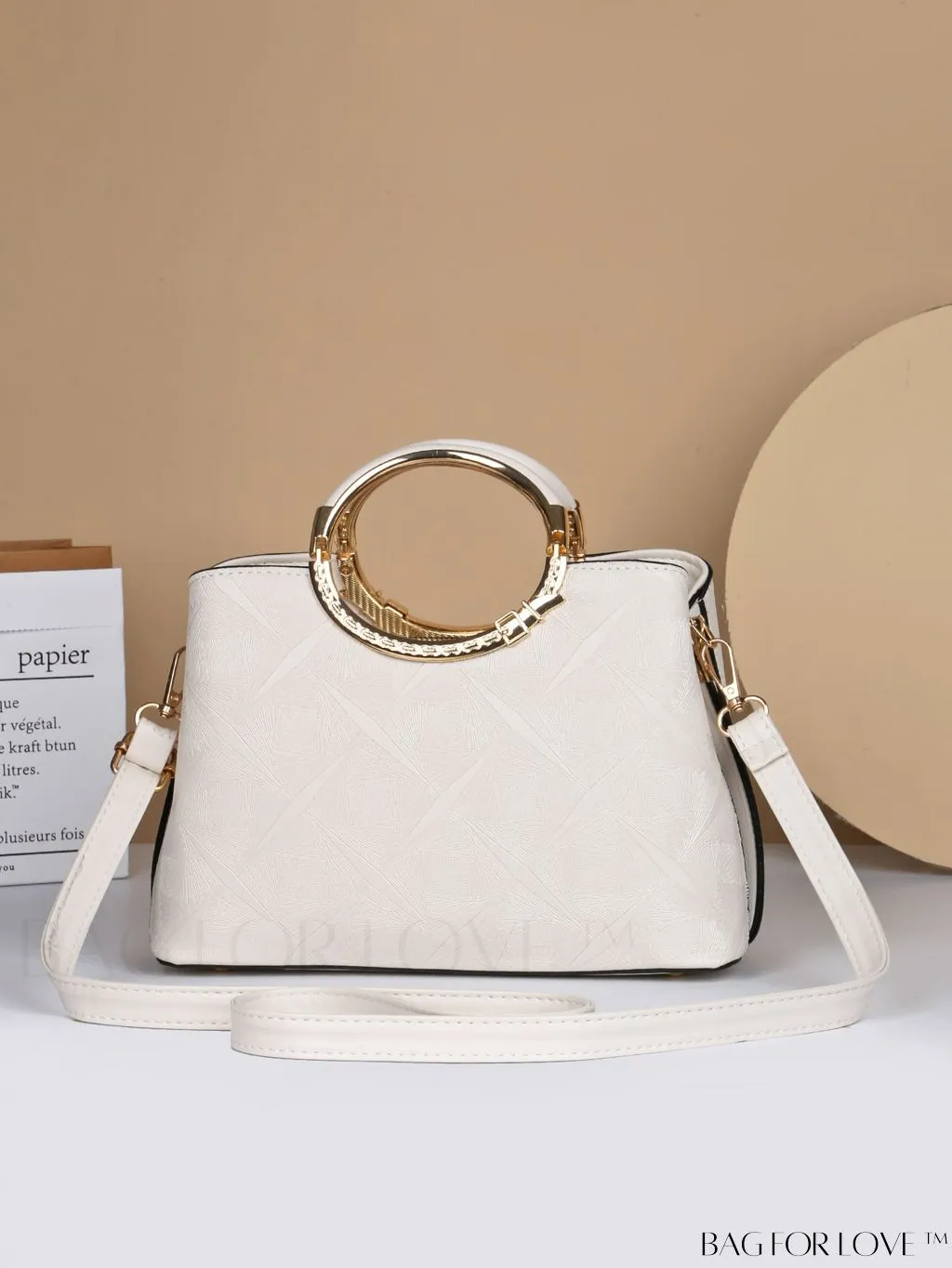 BagForLove - Embossed Metal Ring Handbag: Fashionable, Minimalistic Design for Commuting