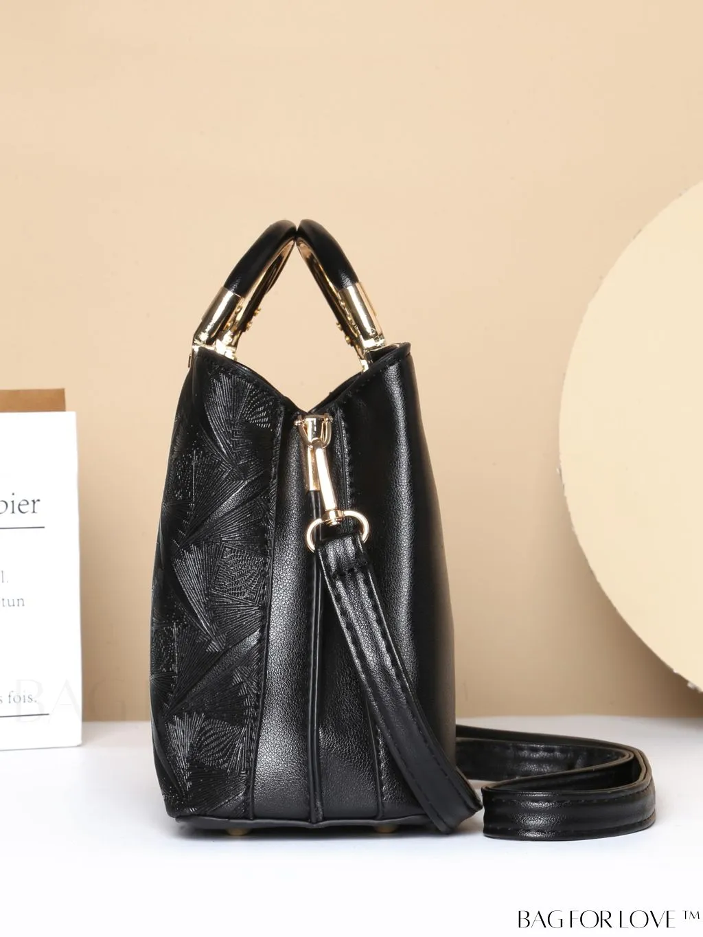 BagForLove - Embossed Metal Ring Handbag: Fashionable, Minimalistic Design for Commuting