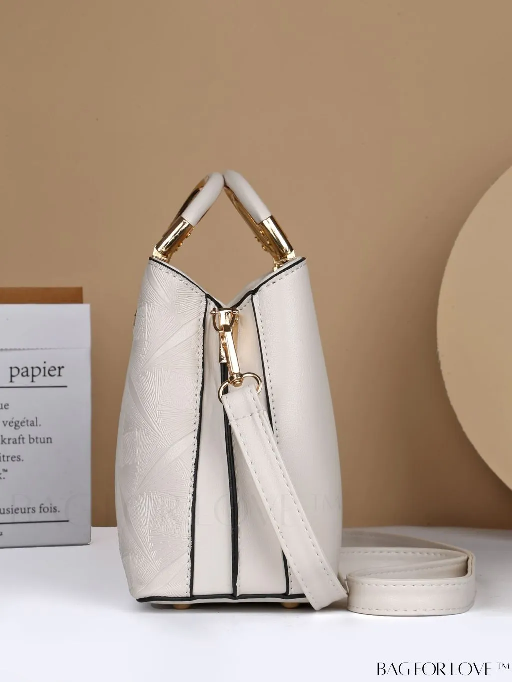 BagForLove - Embossed Metal Ring Handbag: Fashionable, Minimalistic Design for Commuting