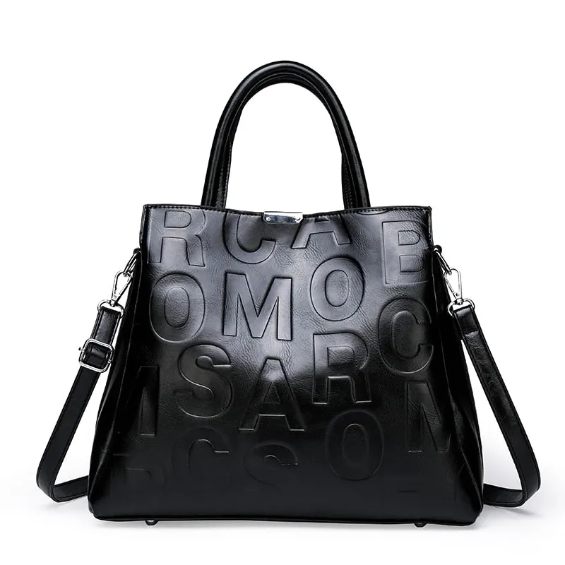 Kayla Letter Embossed Trapeze Bag - 4 Colors