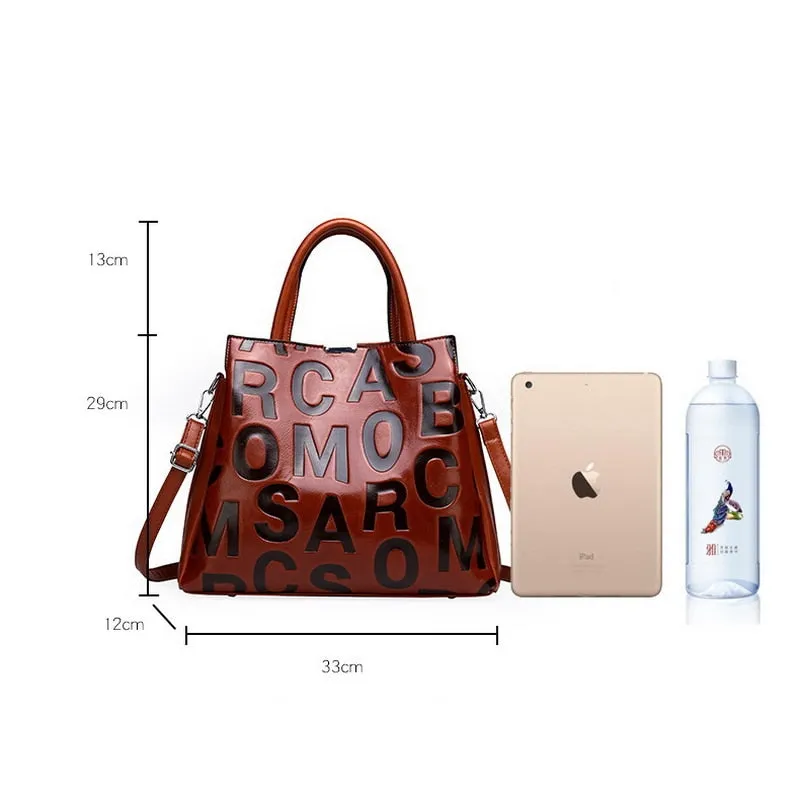 Kayla Letter Embossed Trapeze Bag - 4 Colors