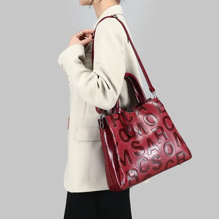 Kayla Letter Embossed Trapeze Bag - 4 Colors