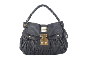 MIU MIU MATELLASE COFFER 42 BLACK CALFSKIN GOLD HARDWARE WITH STRAPS AND DUST COVER