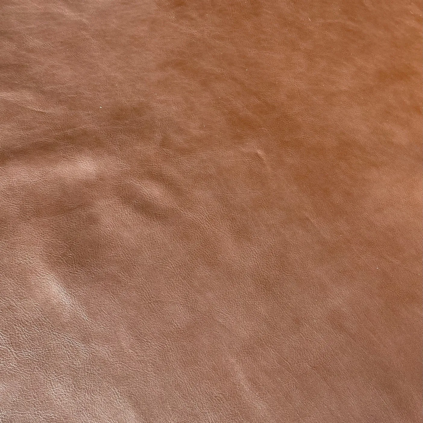 Olympia Cow Half Side | Chocolate | 1.5 mm | 10.5 sq.ft | From $175 ea.