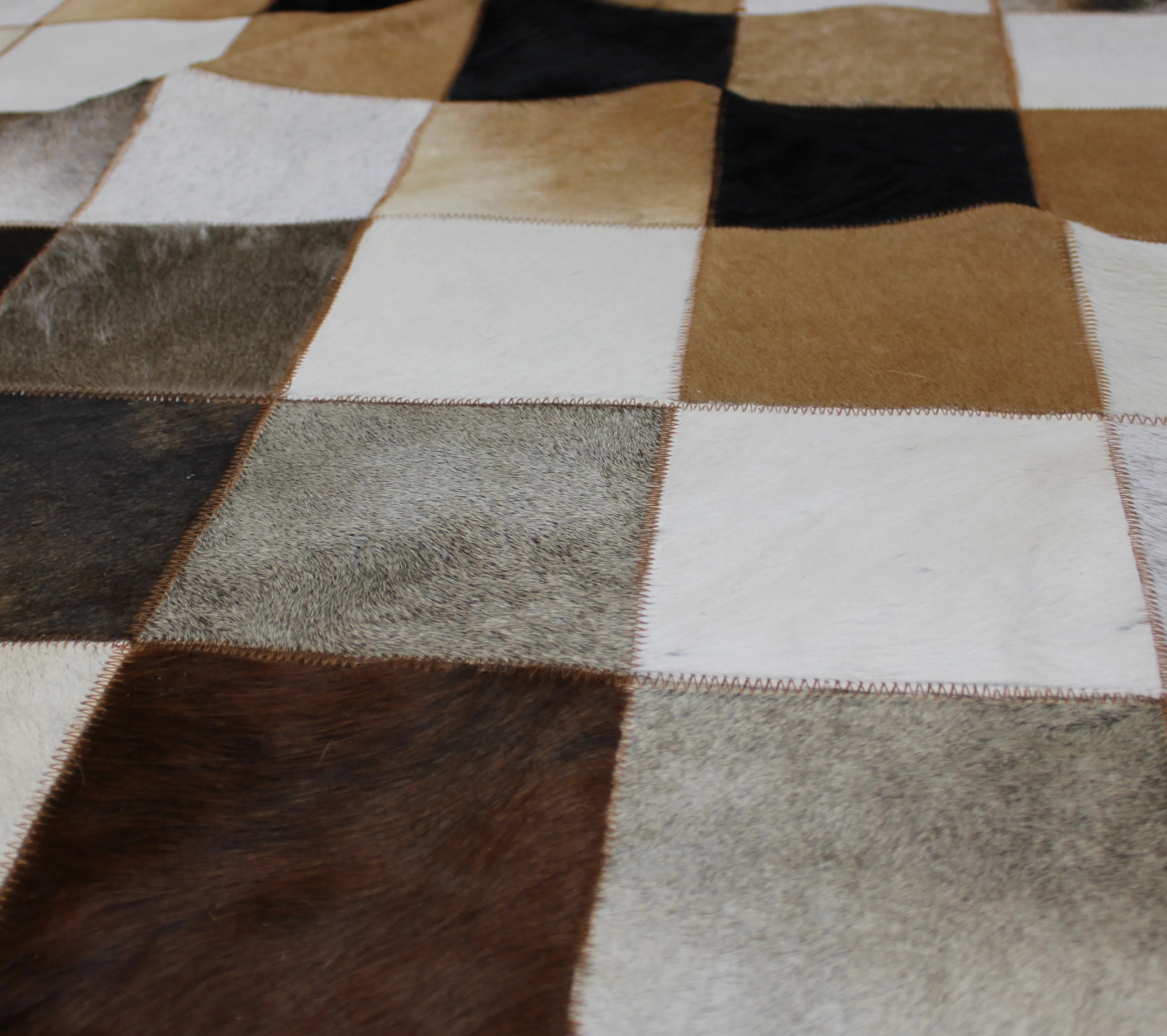 Tricolor Patchwork Cowhide Rug – 7.7ft x 5.6 ft Premium Cowhide Rug